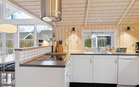 Loreia - 350M from the Sea: Kitchen, Countertop, Wood, Interior Design, Ceiling, Flooring, Kitchen Appliance, Home, Cabinetry, Light Fixture
