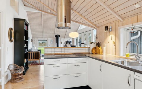 Loreia - 350M from the Sea: Wood, Kitchen, Ceiling, Interior Design, Countertop, Flooring, Light Fixture, Home, Cabinetry, Kitchen Appliance