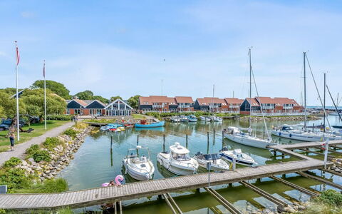 Thorfin - 10M from the Sea: Residential Area, Shrub, House, Home, Garden, Estate, Shade, Landscaping, Lawn