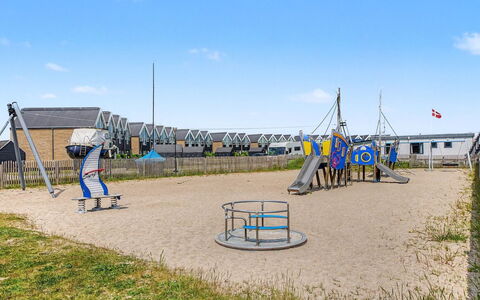 Suna - 95M from the Sea: Sky, Blue, Public Space, Outdoor Play Equipment, Shade, Pole, Sand, Playground, Fence