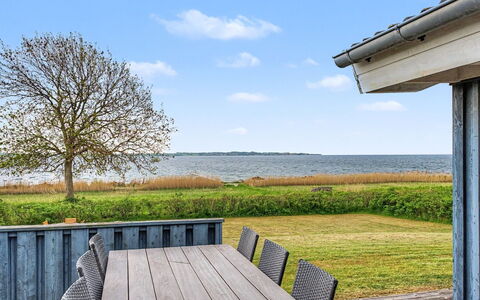 Imelda - 75M from the Sea: Sky, Land Lot, Plank, Hardwood, Shade, Cottage, Outdoor Furniture, Deck, Porch, Lawn