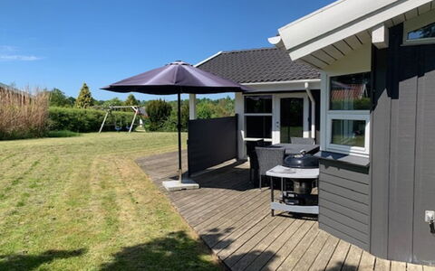 Hedvig - 500M from the Sea: Home, Roof, Shade, Cottage, Siding, Outdoor Furniture, Lawn, Yard, Garden Buildings, Porch