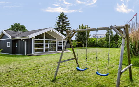 Hedvig - 500M from the Sea: Shade, Lawn, Garden, Garden Buildings, Yard, Landscaping, Outdoor Structure, Siding, Shed, Backyard