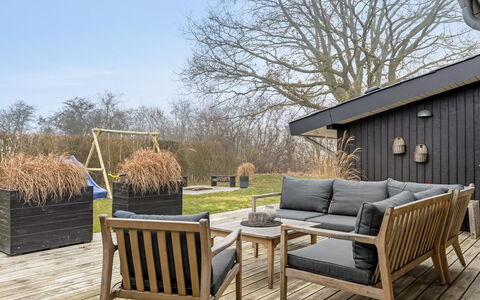 Jurgis - 300M from the Sea: Furniture, Outdoor Furniture, Tableware, Table, Drinkware, Chair, Outdoor Table, Food, Bottle