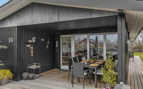 Jurgis - 300M from the Sea: Furniture, Outdoor Furniture, Tableware, Table, Drinkware, Chair, Outdoor Table, Food, Bottle