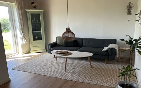 Jorek - 700M from the Sea: Flooring, Furniture, Floor, Wood Flooring, Living Room, Chair, Coffee Table, Hardwood, Wood Stain