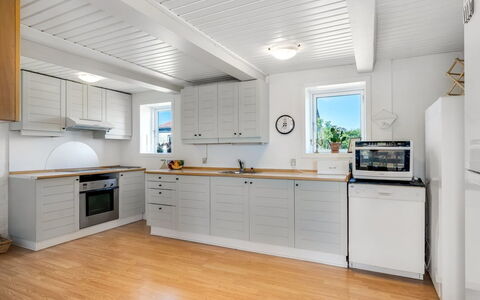 Jorek - 700M from the Sea: Kitchen, Wood, Flooring, Countertop, Major Appliance, Kitchen Appliance, Cabinetry, Interior Design, Ceiling, Floor