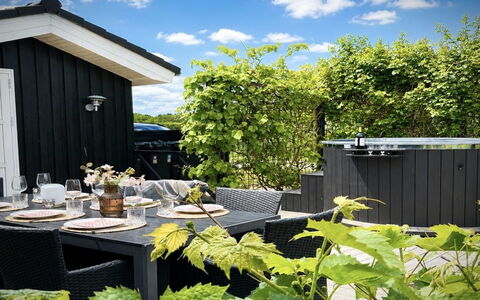 Bosse - 200M to the Fjord: Shrub, Furniture, Garden, Chair, Shade, Flowerpot, Outdoor Furniture, Outdoor Table, Houseplant, Backyard
