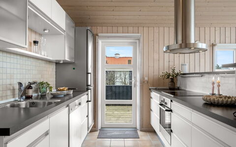 Nomi - 100M from the Sea: Kitchen, Kitchen Appliance, Countertop, Cabinetry, Major Appliance, Interior Design, Flooring, Home Appliance, Kitchen Sink, Wood