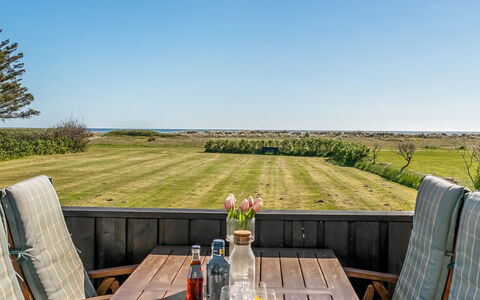 Nomi - 100M from the Sea: Sky, Grass, Furniture, Grassland, Land Lot, Table, Plain, Outdoor Furniture, Outdoor Table, Chair
