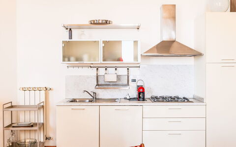 Villa Cristina: Furniture, Kitchen, Kitchen Appliance, Interior Design, Flooring, Wood, Major Appliance, Cabinetry, Countertop, Floor