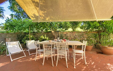 Lucia e Francesco: Furniture, Table, Chair, Outdoor Furniture, Kitchen & Dining Room Table, Outdoor Table, Shade, Flowerpot, Garden, Outdoor Structure