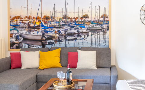 Corte Marina Apartment: Interior Design, Furniture, Flooring, Floor, Room, Couch, Living Room, Picture Frame, Chair