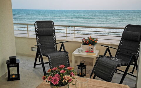 Appartamento Tramonto sul Mare: Furniture, Chair, Wood, Interior Design, Table, Sea, Floor, Lighting, Room, Ocean