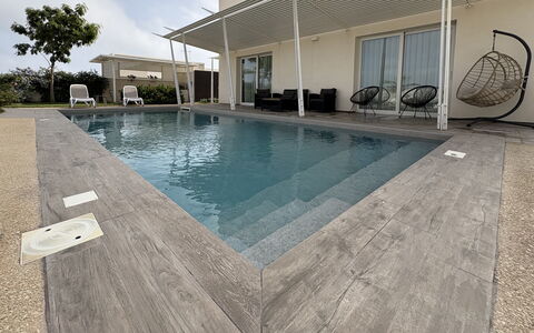 A Casa di Chica: Swimming Pool, Flooring, Floor, Composite Material, Concrete, Outdoor Furniture, Tile, Resort, Flagstone, Water Feature