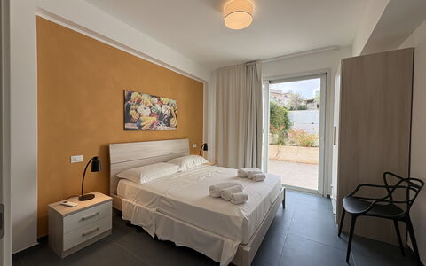 A Casa di Chica: Apartment, Bedroom, Floor, Furniture, Home, Bed, Bed Sheet, Bedding, Bed Frame, Wood Stain