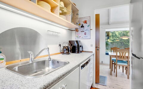 Torkel - 1Km from the Sea: Kitchen, Countertop, Kitchen Appliance, Major Appliance, Interior Design, Flooring, Wood, Furniture, Cabinetry, Home Appliance