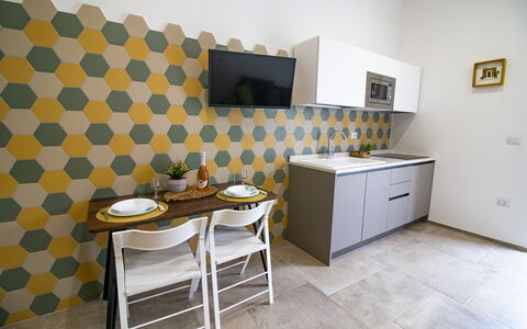 Elementi Luxury Otranto: Furniture, Interior Design, Flooring, Kitchen, Floor, Countertop, Kitchen Appliance, Ceiling, Room, Major Appliance