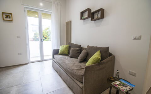 Elementi Luxury Otranto: Furniture, Interior Design, Flooring, Floor, Wood, Couch, Room, Living Room, Home, Lighting