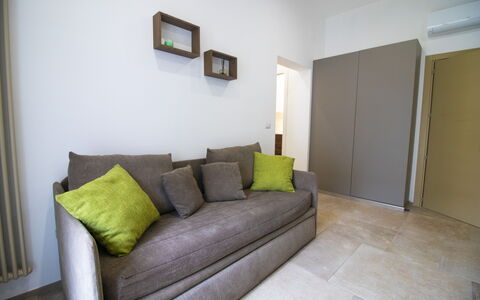 Elementi Luxury Otranto: Furniture, Interior Design, Flooring, Floor, Couch, Wood, Room, Lighting, Living Room, Home