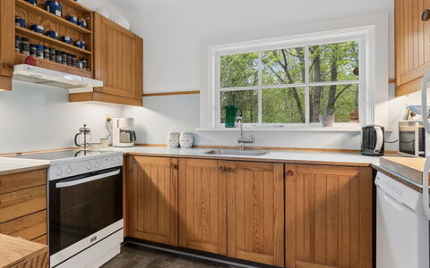 Dalia - 850M from the Sea: Countertop, Kitchen, Cabinetry, Wood, Flooring, Interior Design, Kitchen Appliance, Furniture, Major Appliance, Plumbing Fixture