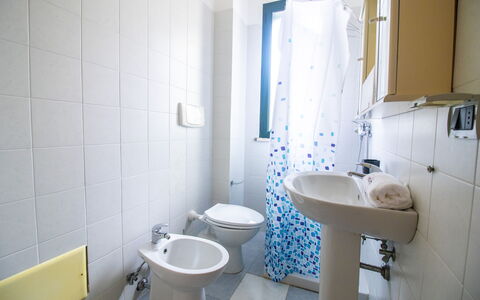 Nicoletta'S House in Otranto: Interior Design, Flooring, Floor, Room, Ceiling, Apartment, Plumbing Fixture, Tile, Chair, Hotel