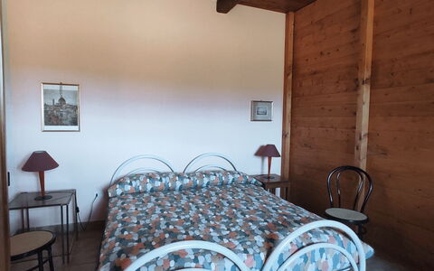 Baita Vignola: Wood, Furniture, Bedroom, Interior Design, Floor, Bed Sheet, Flooring, Linens, Bed, Bedding