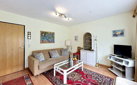 Bergblick: Furniture, Interior Design, Couch, Flooring, Floor, Room, Wood, Living Room, Ceiling, Picture Frame