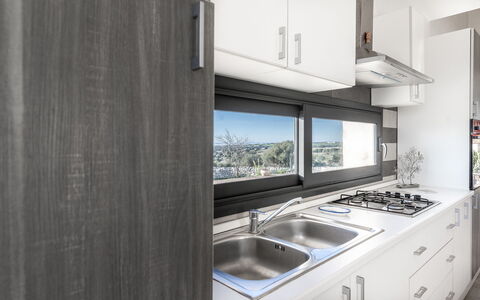 Villa Costa: Kitchen, Countertop, Kitchen Appliance, Interior Design, Major Appliance, Cabinetry, Sink, Home Appliance, Kitchen Stove, Kitchen Sink