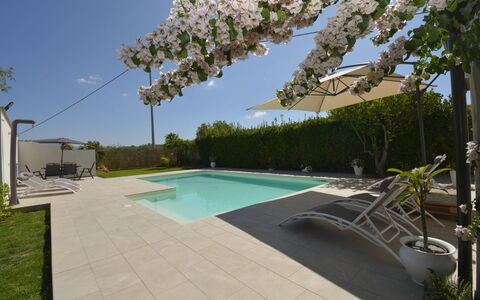 Villa Benvenuti al Sud: Swimming Pool, Composite Material, Resort, Shade, Garden, Landscaping, Outdoor Furniture, Yard, Concrete, Courtyard