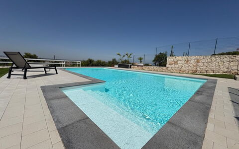 Rari House: Swimming Pool, Composite Material, Floor, Concrete, Tile, Shade, Flagstone, Design, Resort