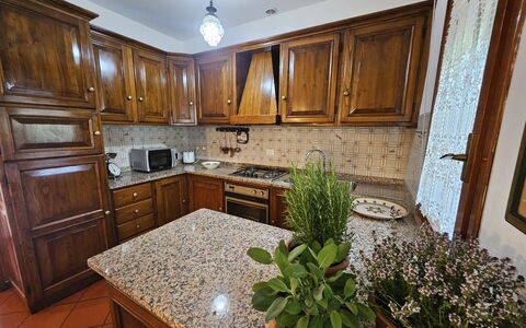Alle Gardenie: Kitchen, Countertop, Kitchen Appliance, Cabinetry, Major Appliance, Flooring, Furniture, Wood, Interior Design, Kitchen Sink