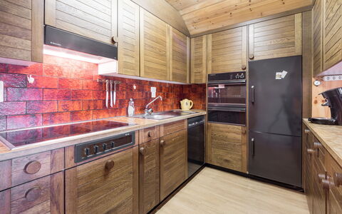 Laax 71: Wood, Kitchen, Interior Design, Flooring, Countertop, Cabinetry, Wood Stain, Ceiling, Light Fixture, Wood Flooring