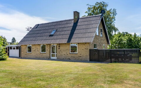 Ulv - from the Sea: Grass, Building, House, Roof, Cottage, Home, Residential Area, Land Lot, Rural Area, Farmhouse