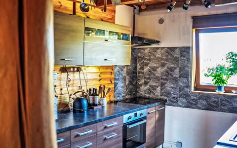 Chata Ujo: Wood, Kitchen, Countertop, Major Appliance, Kitchen Appliance, Interior Design, Home, Cabinetry, Wood Stain, Kitchen Stove