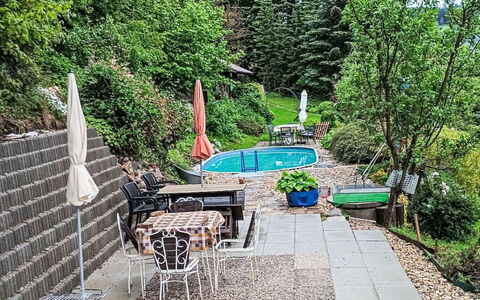 Černý: Garden, Shrub, Outdoor Furniture, Furniture, Flagstone, Chair, Backyard, Groundcover, Shade