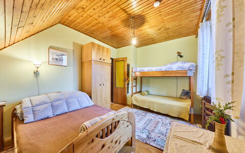 Černý: Bed, Bedroom, Wood, Interior Design, Ceiling, Bed Sheet, Bedding, Floor, Furniture, Bed Frame
