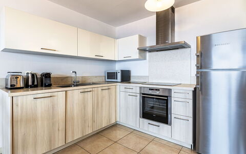 Diana: Flooring, Interior Design, Kitchen, Major Appliance, Countertop, Kitchen Appliance, Wood, Cabinetry, Floor, Room
