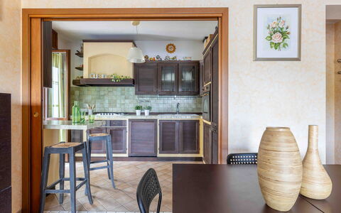 Casa Dolceconero: Furniture, Interior Design, Kitchen, Flooring, Wood, Countertop, Cabinetry, Lighting, Chair, Kitchen & Dining Room Table