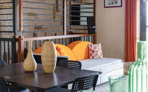 Casa Dolceconero: Furniture, Interior Design, Wall, Chair, Table, Flooring, Floor, Lighting, Living Room, Orange