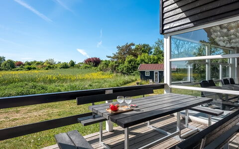 Fria - 200M from the Sea: Porch, Home, Land Lot, Cottage, Outdoor Furniture, Shade, Lawn, Yard, Siding, Garden