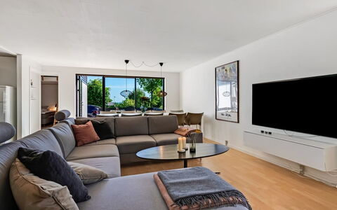 Isalie - 300M from the Sea: Furniture, Interior Design, Couch, Flooring, Living Room, Floor, Wall, Wood, Room, Television