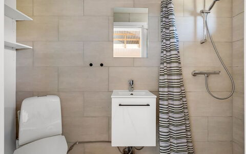 Isalie - 300M from the Sea: Toilet Seat, Bathroom, Flooring, Toilet, Interior Design, Floor, Wall, Plumbing Fixture, Tile, Plumbing