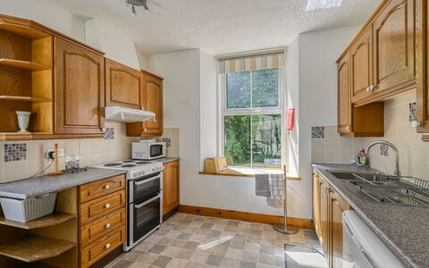 Coach House on Aigas Golf Course: Kitchen, Countertop, Major Appliance, Kitchen Appliance, Wood, Flooring, Cabinetry, Furniture, Interior Design, Floor
