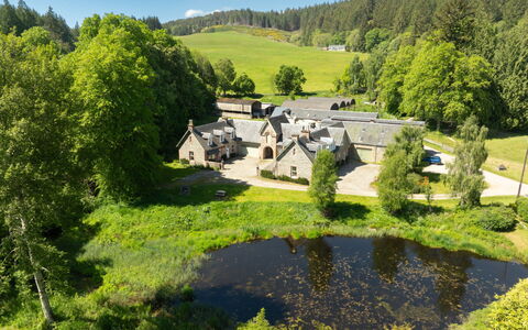 Coach House on Aigas Golf Course: Grass, House, Home, Landscape, Cottage, Shrub, Roof, Estate, Rural Area, Human Settlement