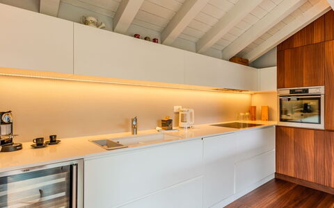 Zani: Kitchen, Interior Design, Flooring, Countertop, Wood, Ceiling, Floor, Cabinetry, Lighting, Kitchen Appliance