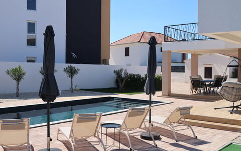 Amara: Residential Area, Architecture, Furniture, Swimming Pool, Outdoor Furniture, Floor, Composite Material, Home, Shade, Apartment