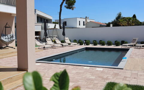 Amara: Swimming Pool, Outdoor Furniture, Urban Design, Composite Material, Resort, Shade, Chair, Concrete, Sunlounger, Estate