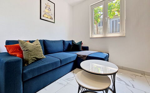 Aurora: Furniture, Flooring, Couch, Interior Design, Floor, Wood, Living Room, Apartment, Room