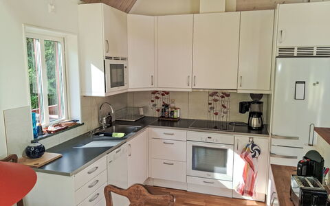 Lövekulle: Kitchen, Kitchen Appliance, Countertop, Furniture, Cabinetry, Flooring, Major Appliance, Interior Design, Wood, Floor